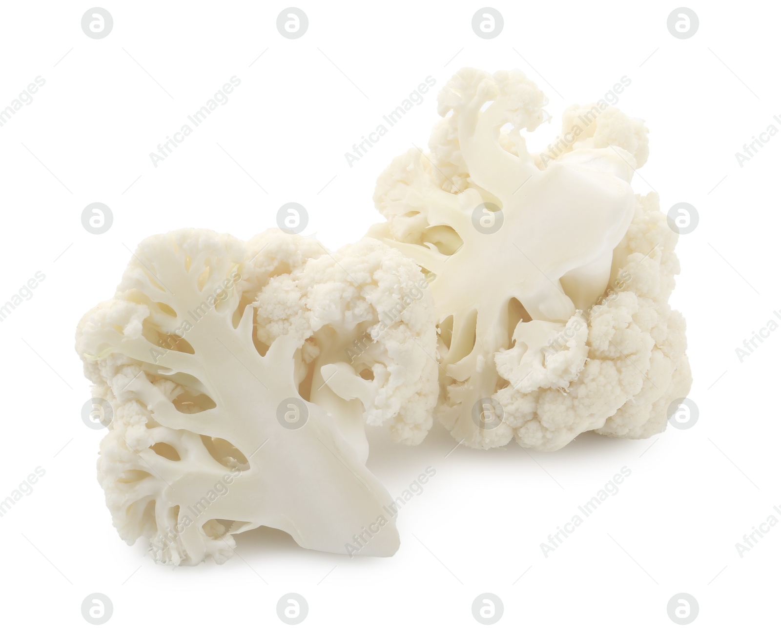Pieces of fresh cauliflower florets isolated on white Photo of Pieces of fresh cauliflower florets isolated on white