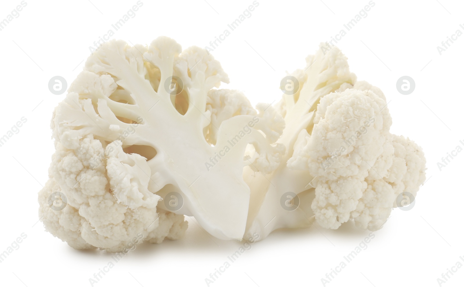 Pieces of fresh cauliflower florets isolated on white Photo of Pieces of fresh cauliflower florets isolated on white
