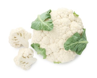 Photo of One fresh cauliflower head and pieces of florets isolated on white, top view