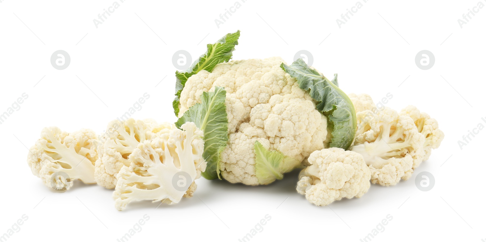 Fresh cauliflower head and pieces of florets isolated on white Photo of Fresh cauliflower head and pieces of florets isolated on white