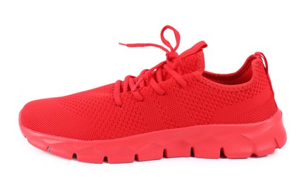 Photo of One stylish red sneaker on white background