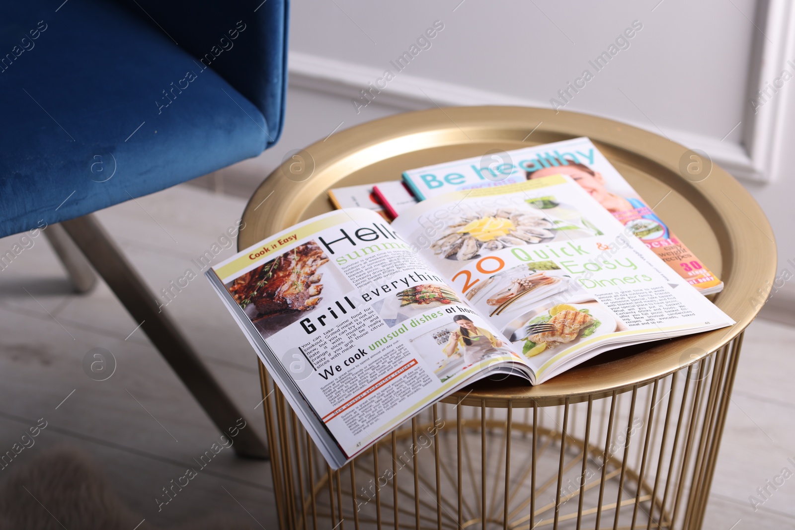 Different trendy magazines on table indoors, closeup Photo of Different trendy magazines on table indoors, closeup