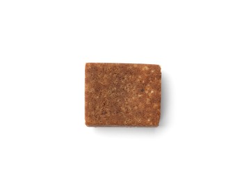 Photo of One aromatic bouillon cube isolated on white, top view