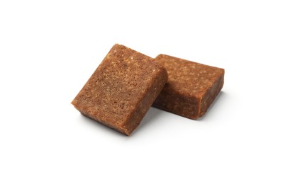 Photo of Two aromatic bouillon cubes isolated on white