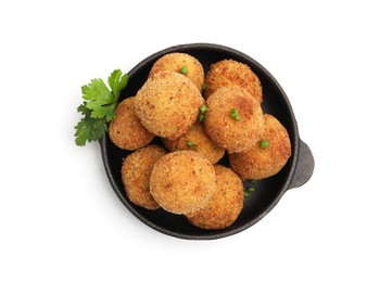Photo of Delicious fried croquette balls with green onion and parsley isolated on white, top view