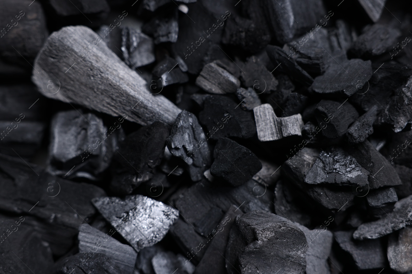 Pieces of black coals as background, top view Photo of Pieces of black coals as background, top view