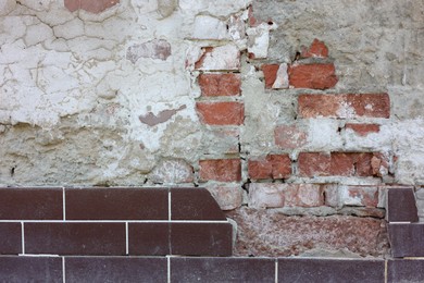 Photo of Texture of old brick wall as background, closeup