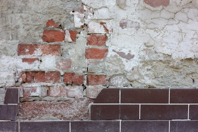 Photo of Texture of old brick wall as background, closeup