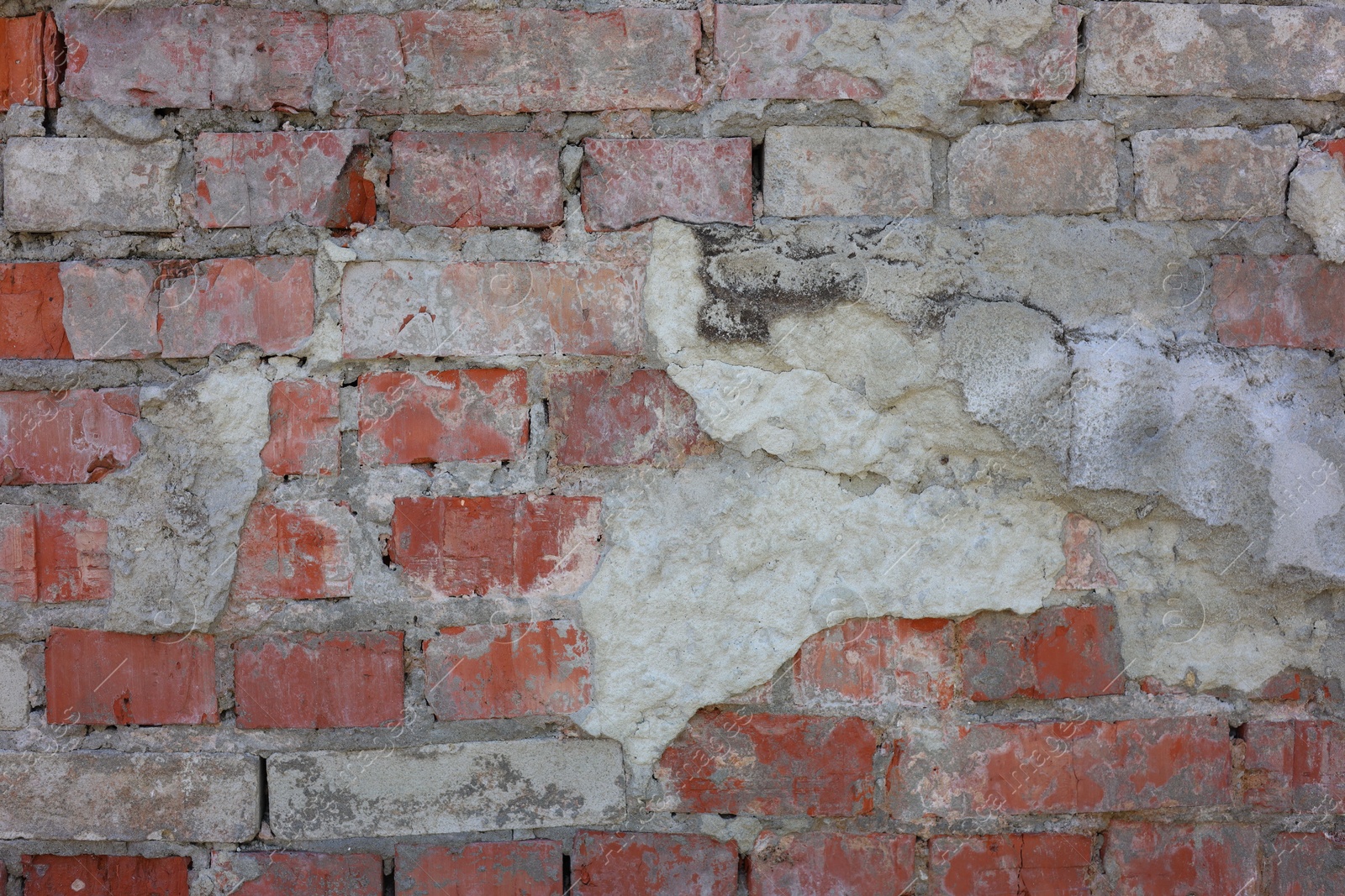 Photo of Texture of old brick wall as background, closeup