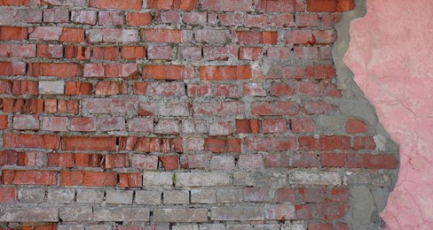 Photo of Texture of old brick wall as background, closeup