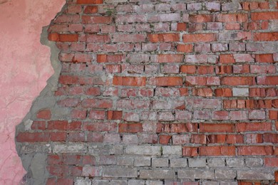 Photo of Texture of old brick wall as background, closeup