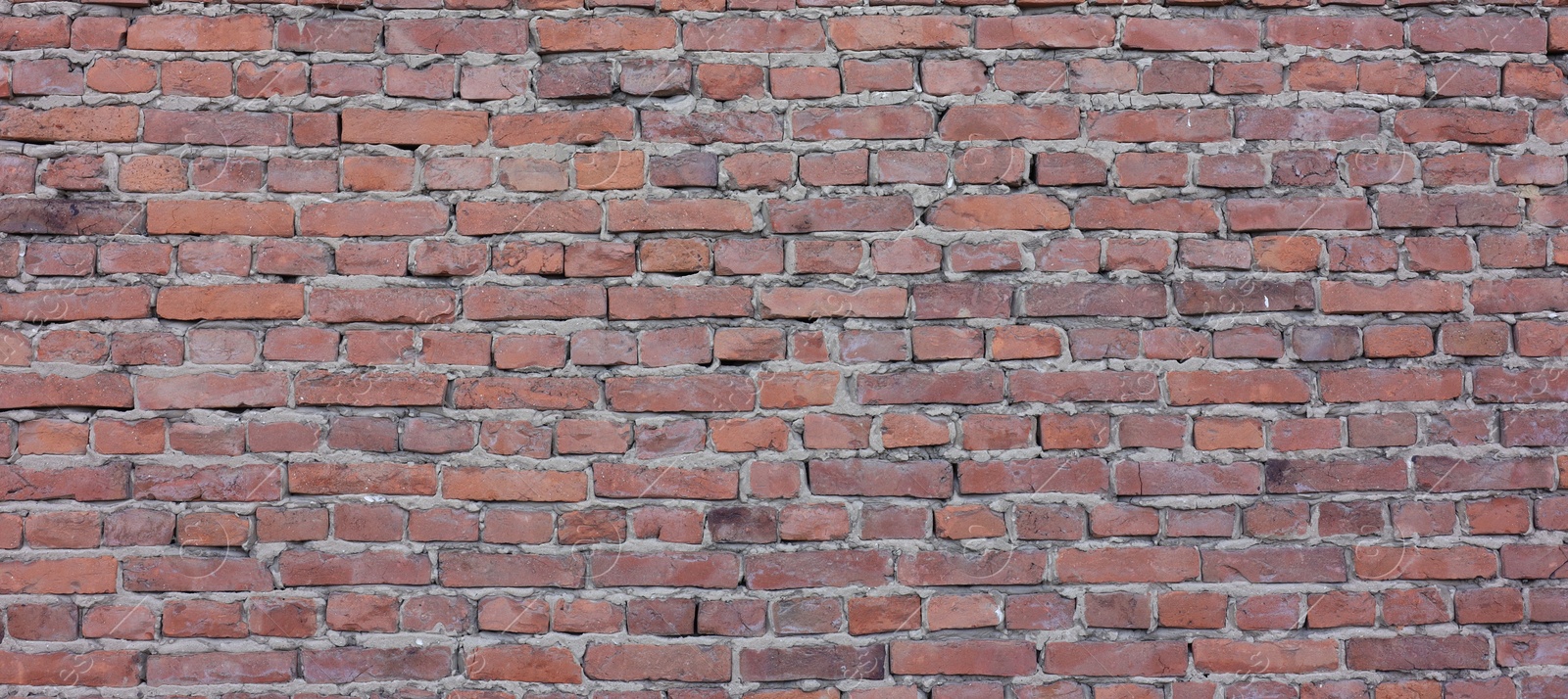 Photo of Texture of red brick wall as background, closeup