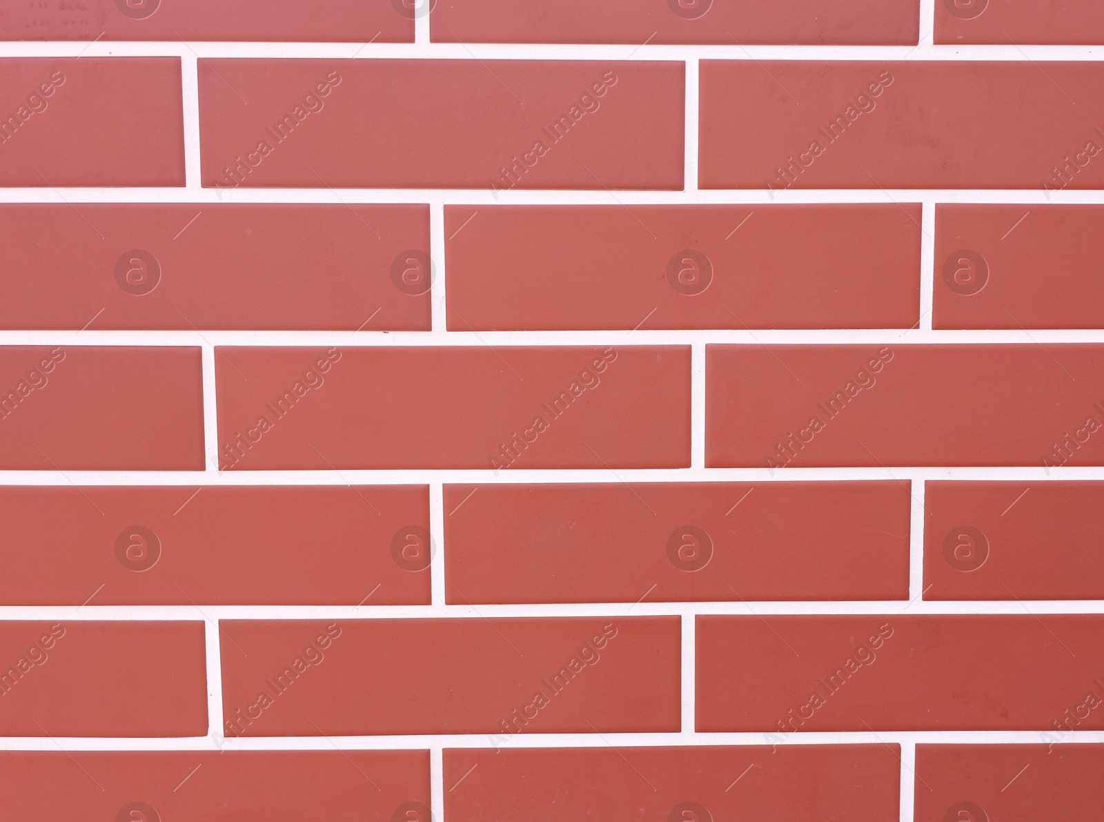 Photo of Texture of red brick wall as background, closeup