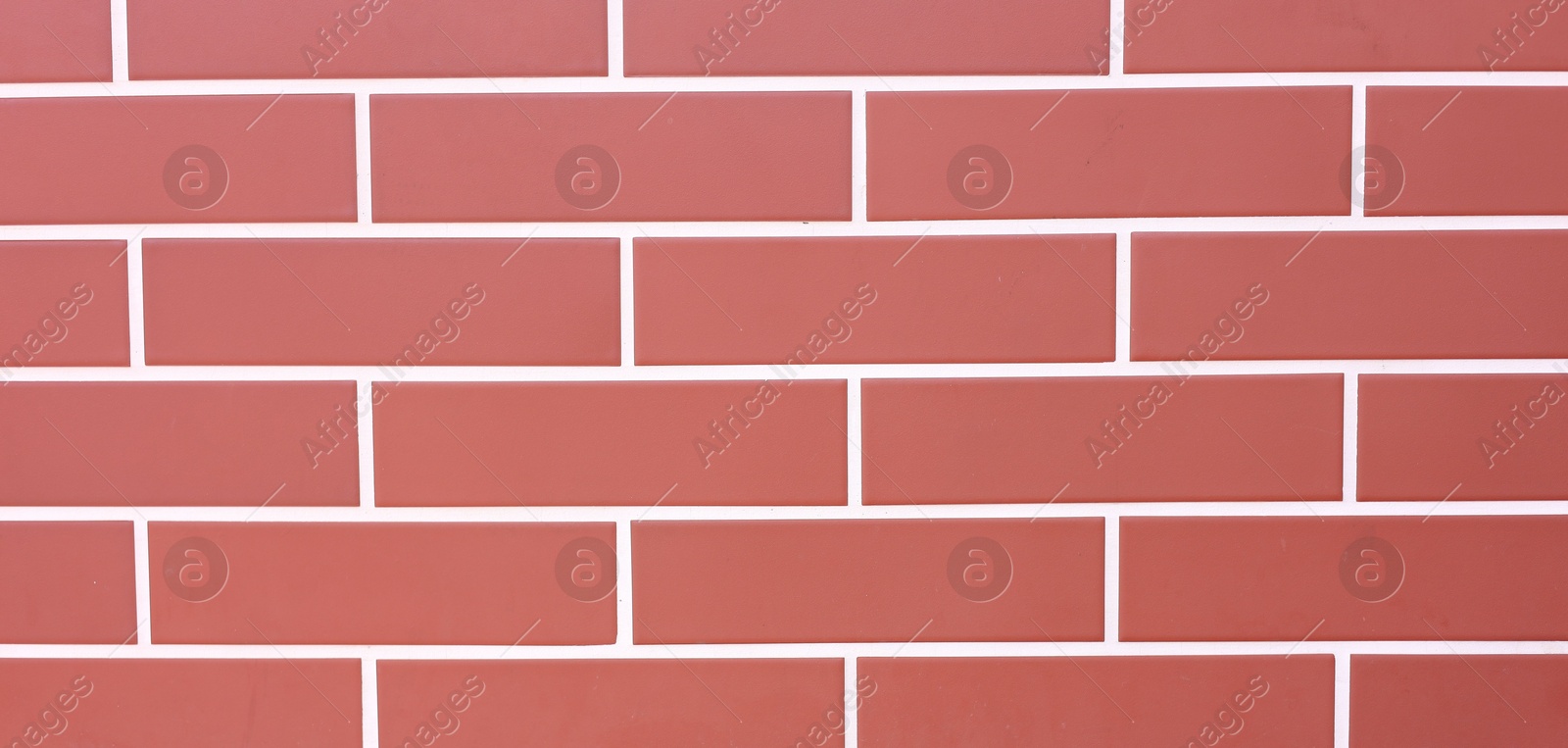 Photo of Texture of red brick wall as background, closeup
