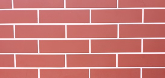 Photo of Texture of red brick wall as background, closeup