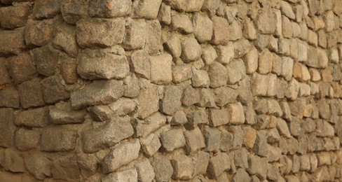 Photo of Texture of stone wall as background, closeup