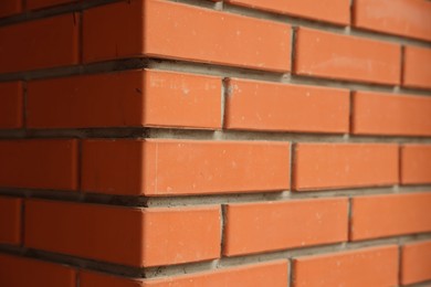 Photo of Texture of red brick wall as background, closeup