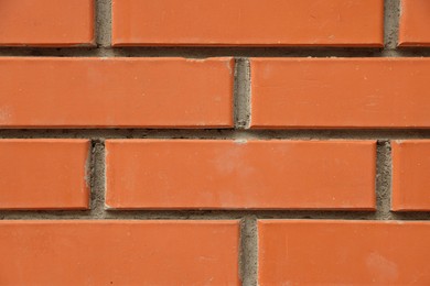 Photo of Texture of red brick wall as background, closeup