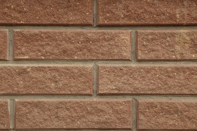 Photo of Texture of brick wall as background, closeup