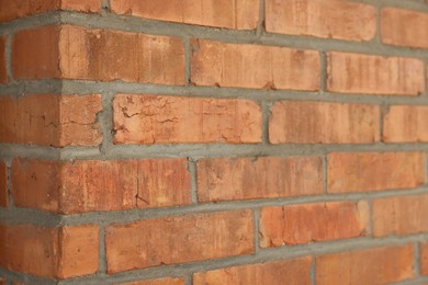 Photo of Texture of red brick wall as background, closeup