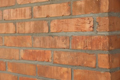 Photo of Texture of red brick wall as background, closeup