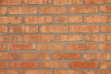 Photo of Texture of red brick wall as background, closeup