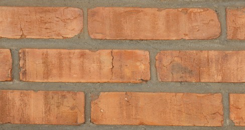 Photo of Texture of red brick wall as background, closeup