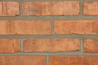 Photo of Texture of red brick wall as background, closeup