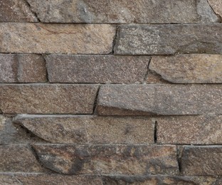 Photo of Texture of brick wall as background, closeup