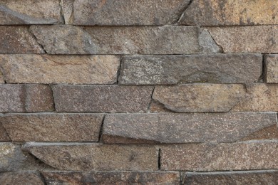 Photo of Texture of brick wall as background, closeup