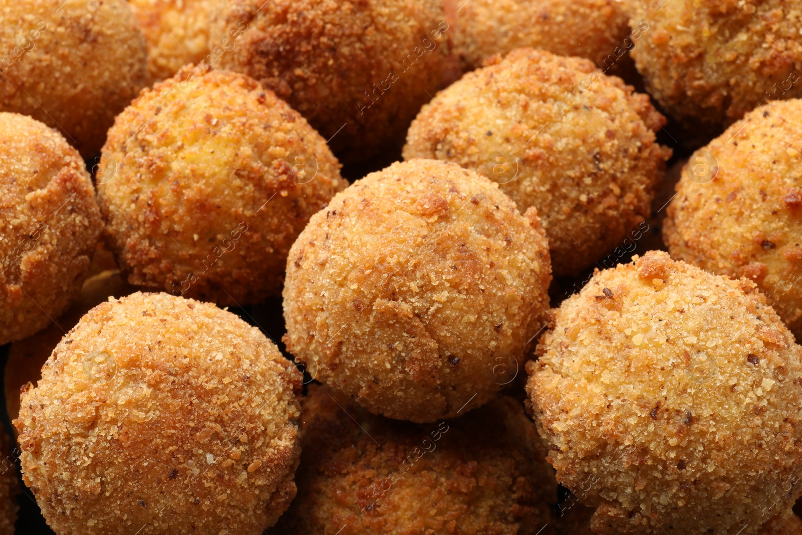 Photo of Delicious fried croquette balls as background, closeup