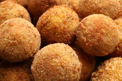 Photo of Delicious fried croquette balls as background, closeup