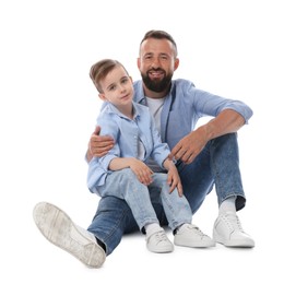 Photo of Family. Smiling dad and his son on white background