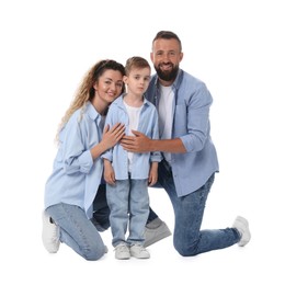 Photo of Family. Happy parents and their son on white background