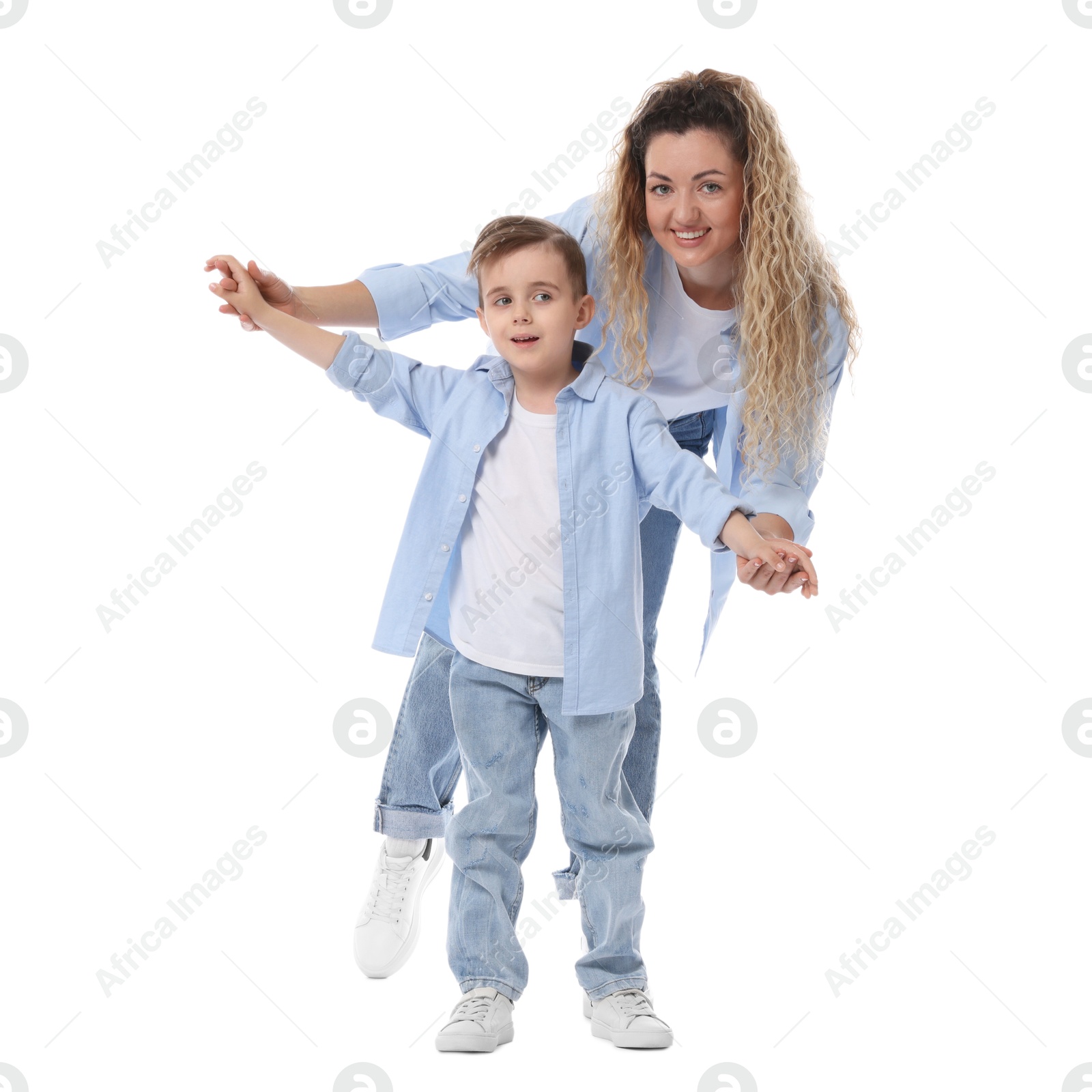 Family. Happy mother and her son having fun on white background Photo of Family. Happy mother and her son having fun on white background