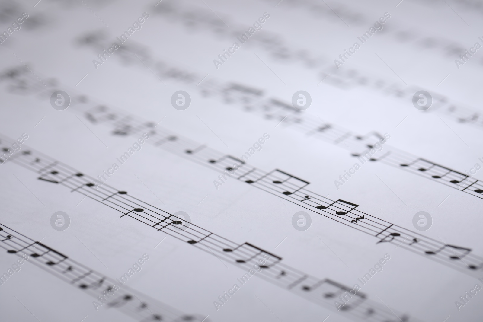 Sheet with musical notes as background, closeup Photo of Sheet with musical notes as background, closeup