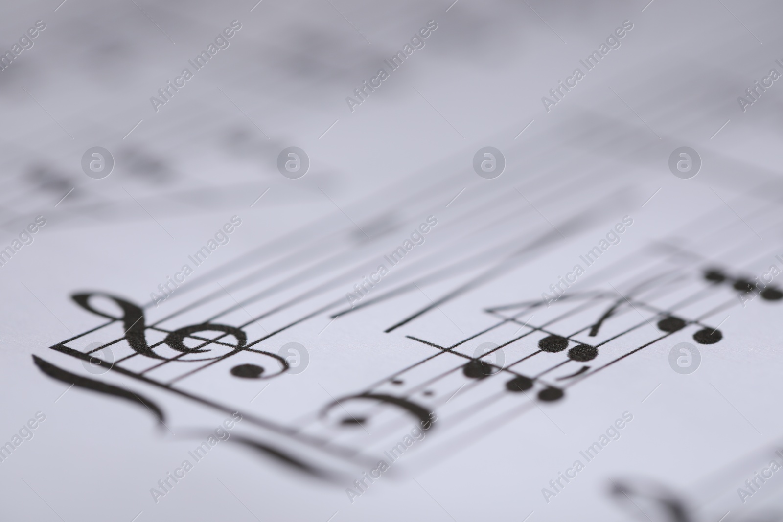 Sheet with musical notes as background, closeup Photo of Sheet with musical notes as background, closeup