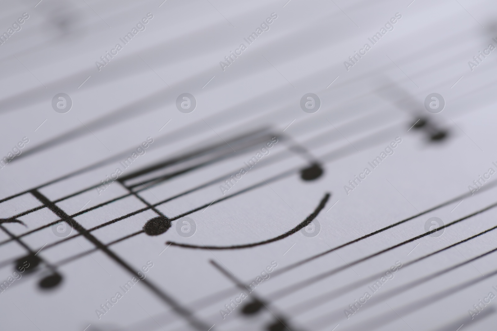 Sheet with musical notes as background, closeup Photo of Sheet with musical notes as background, closeup