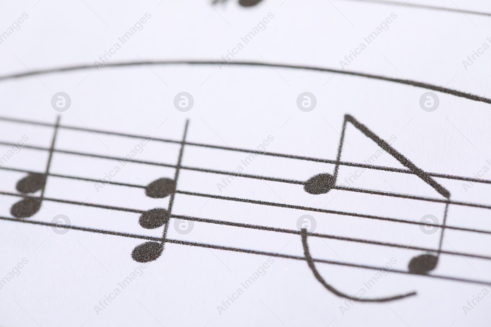 Sheet with musical notes as background, closeup Photo of Sheet with musical notes as background, closeup