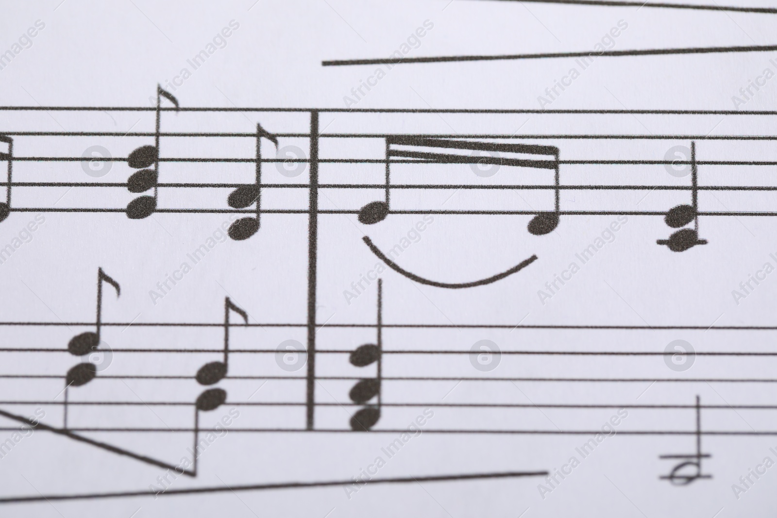 Sheet with musical notes as background, closeup Photo of Sheet with musical notes as background, closeup