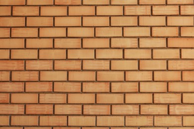 Photo of Texture of red brick wall as background, closeup