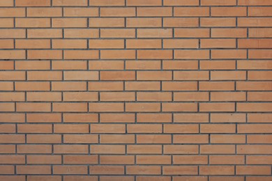 Photo of Texture of red brick wall as background, closeup
