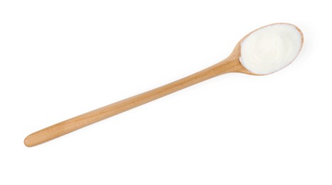 Photo of Tasty yoghurt in spoon isolated on white, top view