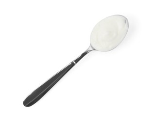 Photo of Tasty yoghurt in spoon isolated on white, top view
