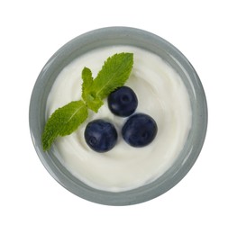 Photo of Tasty yoghurt with blueberries and mint in bowl isolated on white, top view