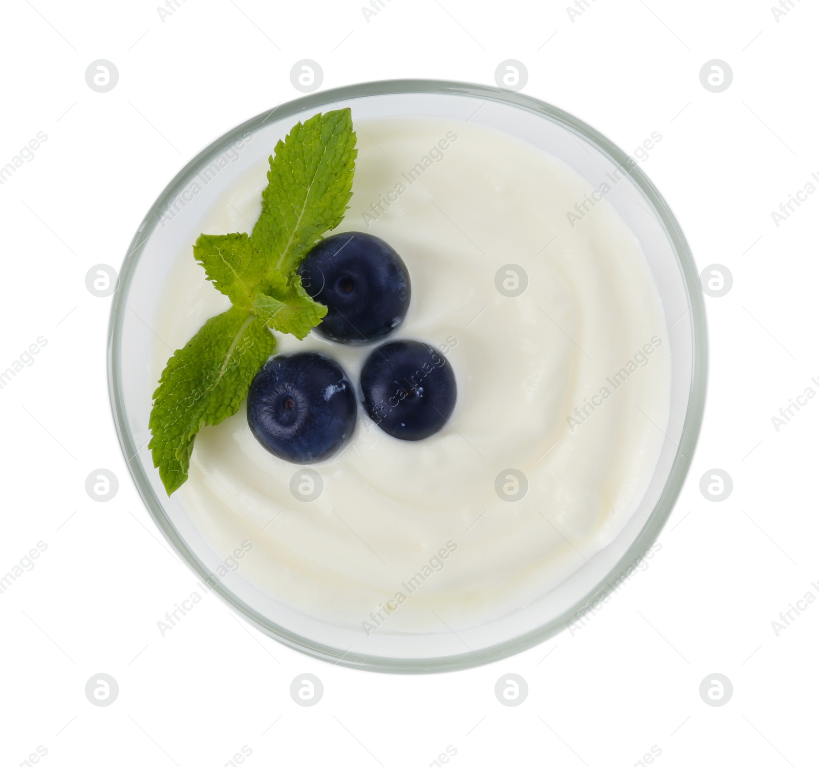 Photo of Tasty yoghurt with blueberries and mint in bowl isolated on white, top view