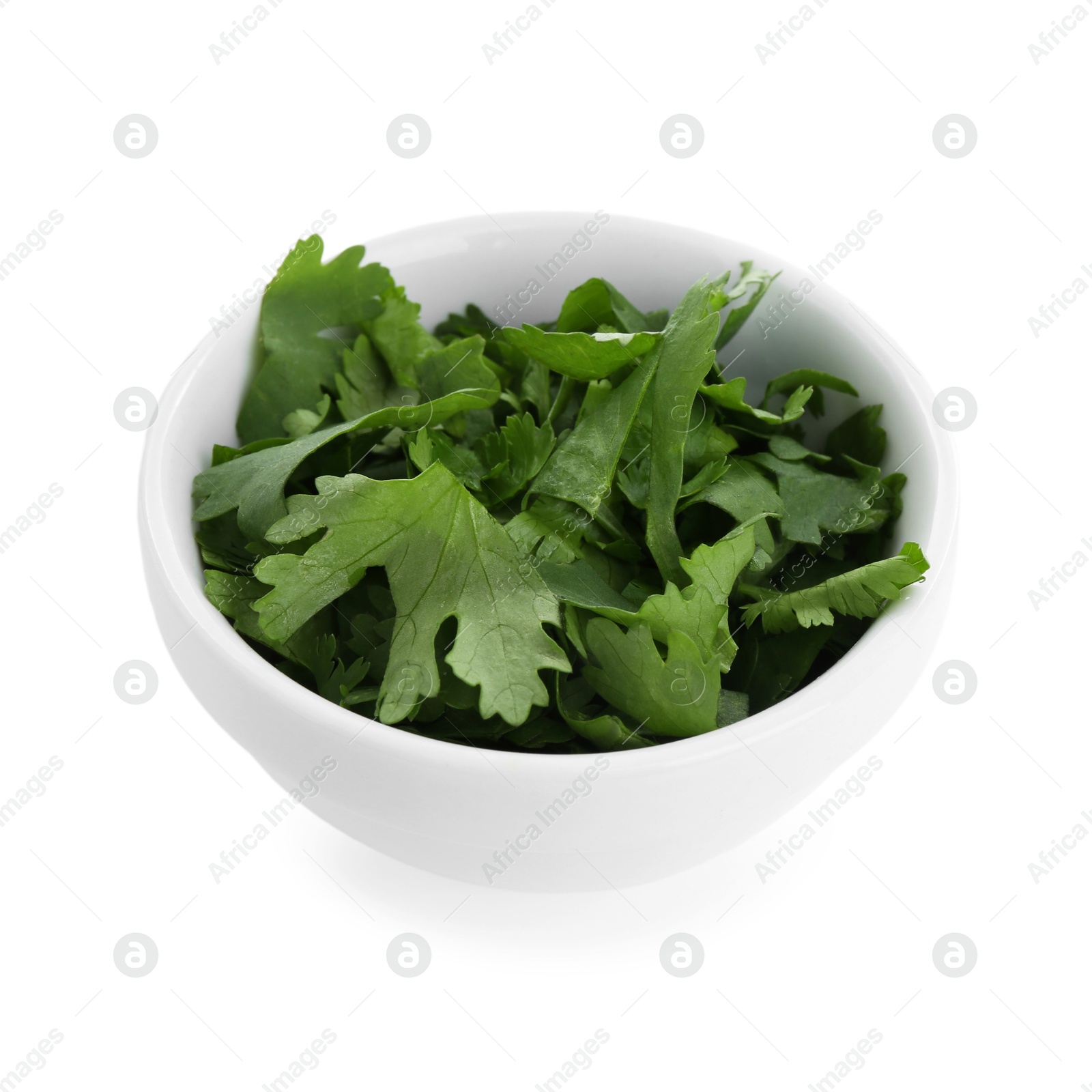 Photo of Aromatic cilantro in bowl isolated on white
