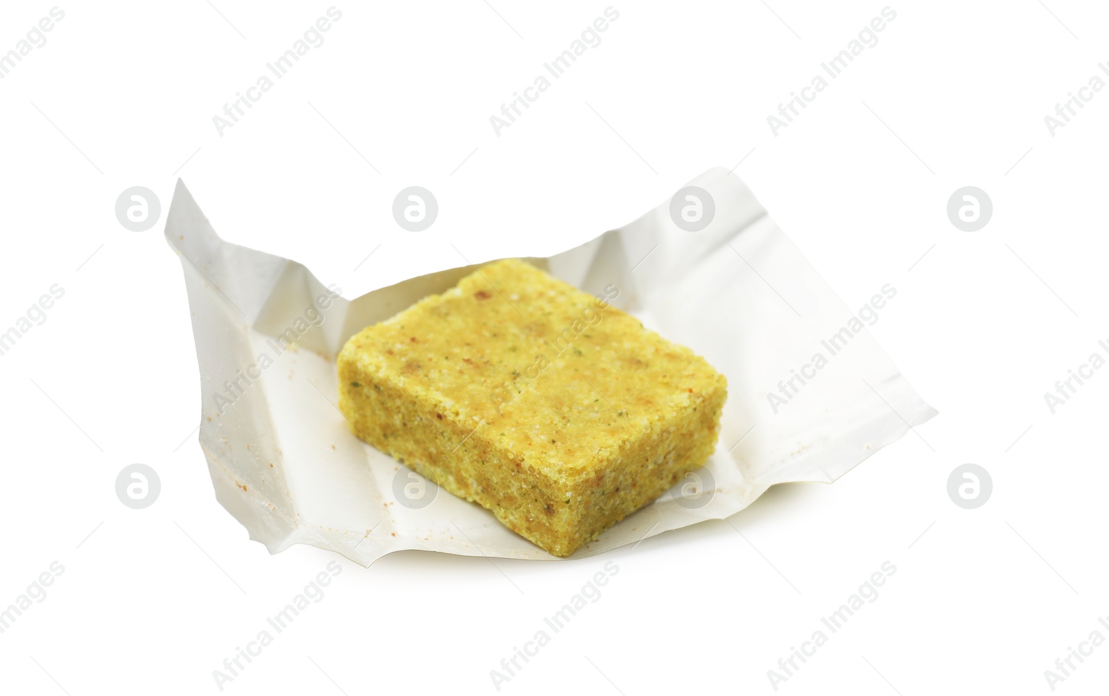 One aromatic bouillon cube isolated on white Photo of One aromatic bouillon cube isolated on white