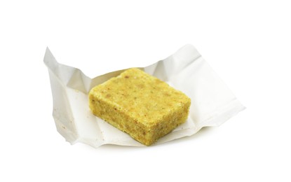 Photo of One aromatic bouillon cube isolated on white