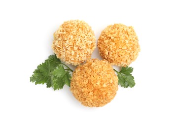 Photo of Delicious fried croquette balls and parsley isolated on white, top view